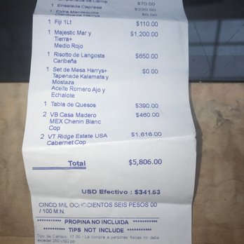 Harry's - Look at the very very very very very bottom... squint... and you will see the 17 percent exchange fee info WRITTEN IN SPANISH! Boo. - Steakhouses Near Me - Cancún, ROO