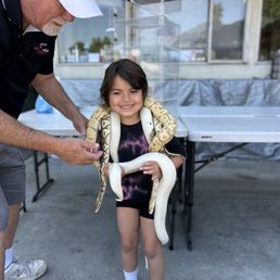 My daughter with 4 snakes!!