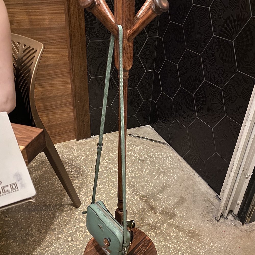 Pisco Peruvian Gastrobar - Purse rack they brought to our table for us - Peruvian Near Me - Orlando, Florida Pisco Peruvian Gastrobar - Purse rack they brought to our table for us - Peruvian Near Me - Orlando, Florida
