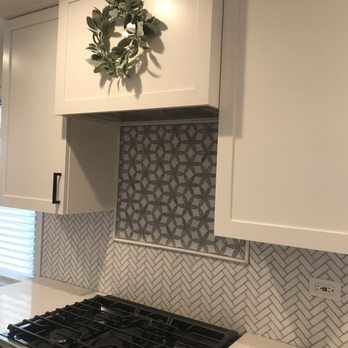 Precisionlux Home Remodeling - Backsplash under range hood - General Contractors Near Me Precisionlux Home Remodeling - Backsplash under range hood - General Contractors Near Me