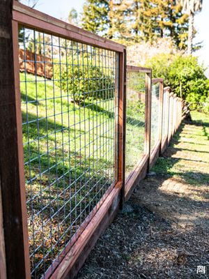 Picture Framed Hog Wire - Our family owned business specializes in replacements and new builds of residential fencing. Primarily redwood fencing however, we now offer automatic gate installations. Call us for a free quote today! Picture Framed Hog Wire - Our family owned business specializes in replacements and new builds of residential fencing. Primarily redwood fencing however, we now offer automatic gate installations. Call us for a free quote today!