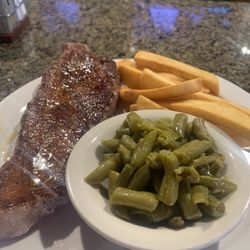 Shooter's Lounge - Steak and Salad! $23 12 ounce New York Strip grilled and served by the owner, the lovely lady Mimi!