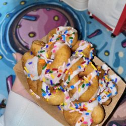 Little Trolley Donuts - Vanilla drizzle with rainbow sprinkles