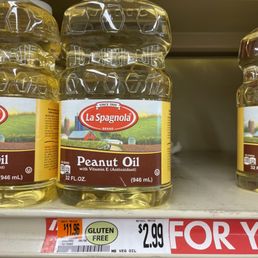 a display of peanut oil for sale a display of peanut oil for sale
