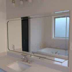 Thibodaux Glass - Bevel strips added to mirror. Add some luxury to your bathroom.