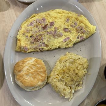 The Toasted Yolk Cafe - 4 egg ham & cheese omelet with biscuit & hash brown casserole. Yum - Breakfast & Brunch Near Me - Addison, Texas The Toasted Yolk Cafe - 4 egg ham & cheese omelet with biscuit & hash brown casserole. Yum - Breakfast & Brunch Near Me - Addison, Texas
