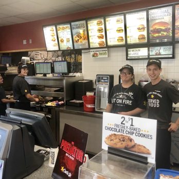 Carl's Jr - two men standing behind a counter - Fast Food Near Me - Walsenburg, Colorado