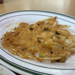 Hash browns, with green onion and Cajun seasoning Hash browns, with green onion and Cajun seasoning