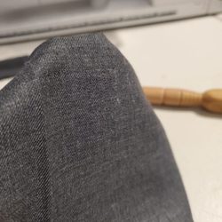 Landylion Studios - Repaired hole in suit pants