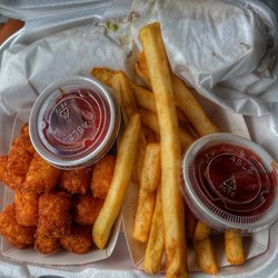 HighStks - Regular order of Tater Tots($4.79) and Regular size of French Fries ($4.29). In the white wrap is The High Steak