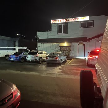 Doucet Saloon - a parking lot at night - Dive Bars Near Me - Castro Valley, California Doucet Saloon - a parking lot at night - Dive Bars Near Me - Castro Valley, California
