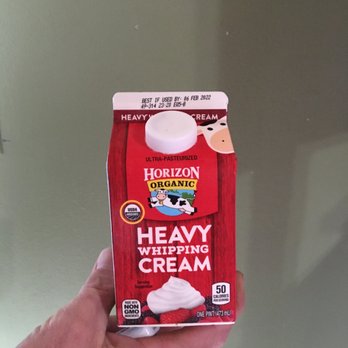 ChoiceMART - a hand holding a carton of cream - Grocery Near Me - Captain Cook, Hawaii