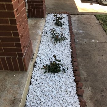 Freedom Lawn Services -  brick edging with white gravel - Lawn Services Near Me
