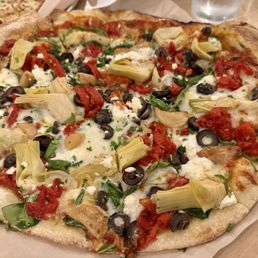 Pizza with artichoke and olives Pizza with artichoke and olives