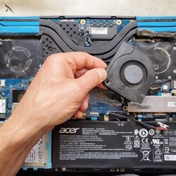 One Laptop Tech - Removing cooling fans from an gaming laptop. The laptop started overheating because the heatsink got completely clogged. Cleanup will fix it