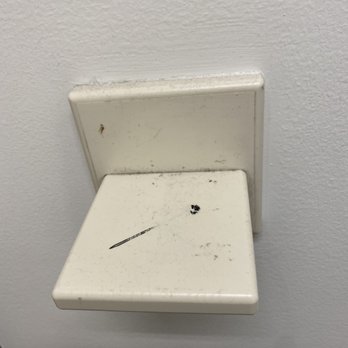 Macy's - Dusty Shelf in dressing area.  Again, they are so concerned about COVID and the dressing area looks like this. - Department Stores Near Me - Northridge, California
