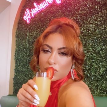 Madres Brunch - Mimosas are fun with a strawberry on top - Breakfast & Brunch Near Me - Whittier, California