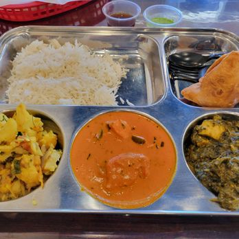 Azaad Indian Cuisine - My lunch special ($14.99), with samosa, rice, Aloo Gobi, chicken tiki Masala, paneer saag, naan, and beverage. - Indian Near Me - Riverside, California Azaad Indian Cuisine - My lunch special ($14.99), with samosa, rice, Aloo Gobi, chicken tiki Masala, paneer saag, naan, and beverage. - Indian Near Me - Riverside, California