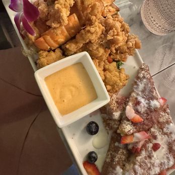 Casa De Amore - Lobster bites with waffles however they gave her French toast but she actually enjoyed the French toast - Seafood Near Me - Tamarac, Florida Casa De Amore - Lobster bites with waffles however they gave her French toast but she actually enjoyed the French toast - Seafood Near Me - Tamarac, Florida
