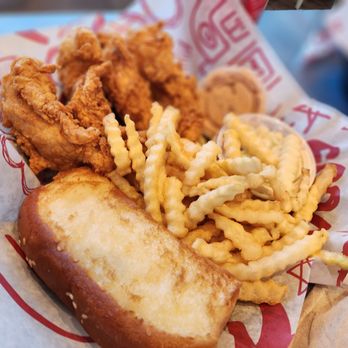 Raising Cane's Chicken Fingers - a basket of fried food - Fast Food Near Me - Marlborough, Massachusetts Raising Cane's Chicken Fingers - a basket of fried food - Fast Food Near Me - Marlborough, Massachusetts