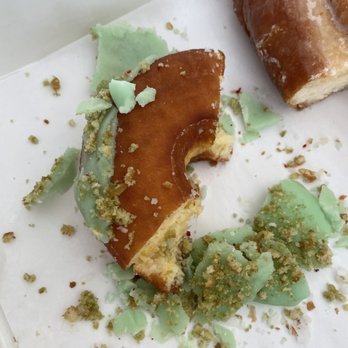 Randy’s Donuts - Frosting comes off easily from the specialty donuts - Coffee & Tea Near Me - San Diego, California