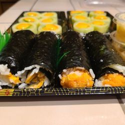 PokeCo - 2 spicy salmon handrolls. 2 spicy scallop handrolls.