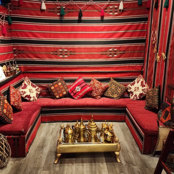 Taqwa's Bakery & Restaurant - a red couch and a coffee table - Middle Eastern Near Me - Greenfield, Wisconsin Taqwa's Bakery & Restaurant - a red couch and a coffee table - Middle Eastern Near Me - Greenfield, Wisconsin