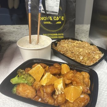 Nova Cafe - Firecracker Mandarin Orange chicken, Chinese vegetable fried rice & side of steamed jasmine white rice included with meal. - Thai Near Me - Roswell, Georgia Nova Cafe - Firecracker Mandarin Orange chicken, Chinese vegetable fried rice & side of steamed jasmine white rice included with meal. - Thai Near Me - Roswell, Georgia
