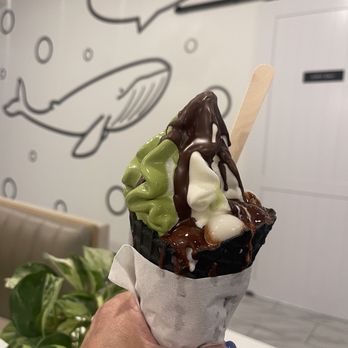 Indigo Cow - Swirl on waffle cone with Theo dark chocolate wall and mochi ball toppings - Ice Cream & Frozen Yogurt Near Me - Bellevue, Washington Indigo Cow - Swirl on waffle cone with Theo dark chocolate wall and mochi ball toppings - Ice Cream & Frozen Yogurt Near Me - Bellevue, Washington