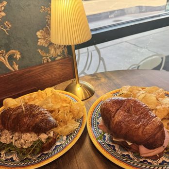Gabi Coffee and Bakery - Chicken, cranberry croissant and a ham and cheese croissant. Choice of chips or salad on the side - Bakeries Near Me - Henderson, Nevada Gabi Coffee and Bakery - Chicken, cranberry croissant and a ham and cheese croissant. Choice of chips or salad on the side - Bakeries Near Me - Henderson, Nevada