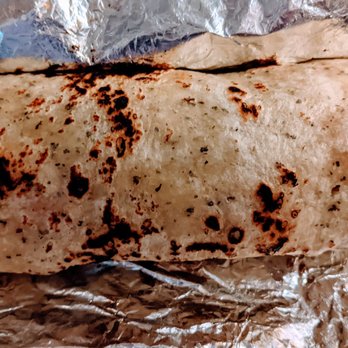 Tacotlan - Lalo's on the Beach Burrito - Premium outer skirt steak with shrimp, guacamole, lettuce and tomato and aguacate and chipotle salsas - Mexican Near Me - Chicago, Illinois Tacotlan - Lalo's on the Beach Burrito - Premium outer skirt steak with shrimp, guacamole, lettuce and tomato and aguacate and chipotle salsas - Mexican Near Me - Chicago, Illinois