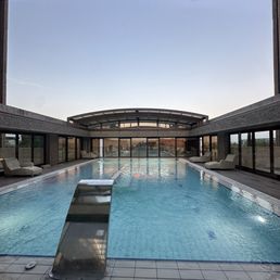 Lovely gym and pool with retractable roof Lovely gym and pool with retractable roof