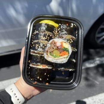 Odagada - a person holding a tray of sushi - Chicken Wings Near Me - Dublin, California Odagada - a person holding a tray of sushi - Chicken Wings Near Me - Dublin, California
