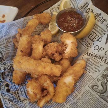 Bistro 7 - Crispy Calamari hand-cut, panko-crusted strips - never rings or tentacles - paired with a sweet chili dipping sauce. - New American Near Me - Reno, Nevada Bistro 7 - Crispy Calamari hand-cut, panko-crusted strips - never rings or tentacles - paired with a sweet chili dipping sauce. - New American Near Me - Reno, Nevada