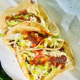 three tacos on a paper plate three tacos on a paper plate