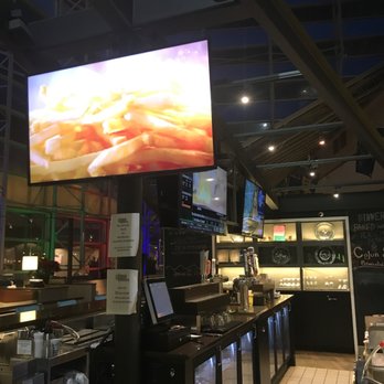 Baker's Bar and Grille - a large television screen - Bars Near Me - South Bend, Indiana
