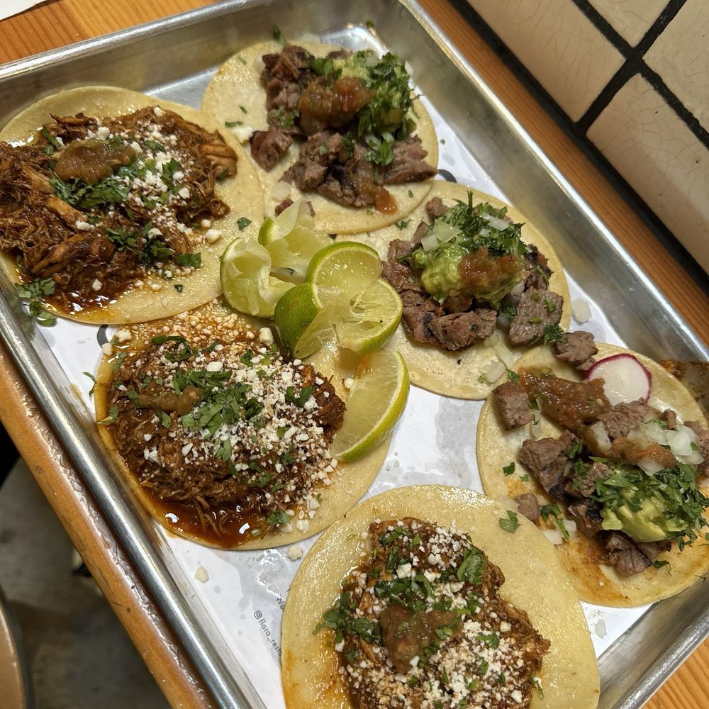Chicken Mole and carne asada tacos. Chicken Mole and carne asada tacos.