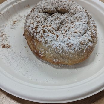 Gyro Gods - Bougasta: custard topped with phyllo dough, rolled, and topped with cinnamon and powdered sugar. - Greek Near Me - Westland, Michigan Gyro Gods - Bougasta: custard topped with phyllo dough, rolled, and topped with cinnamon and powdered sugar. - Greek Near Me - Westland, Michigan