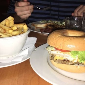 Globe Bookstore & Café - The breakfast burger with a side of french fries - Cocktail Bars Near Me - Prague, Puerto Rico