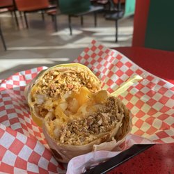 Tacos Blanquita - Breakfast burrito, swapped sausage for chorizo.