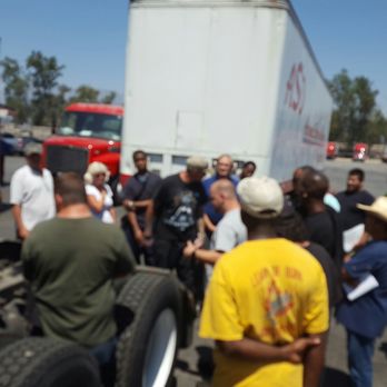 ASD Logistic Services  - Supervisor / Instructor Andrew explaining the tractor and trailor parts. - Driving Schools Near Me - Fontana, California