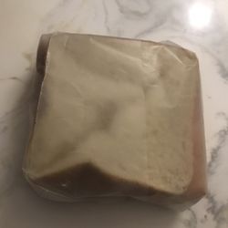 St Gabriel Grocery & Deli - Good ol' turkey sandwich on white, wrapped in wax paper