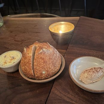 The Musket Room - Sourdough bread. Anchovy butter to the left and Almond citrus butter to the right. - New American Near Me - New York, New York The Musket Room - Sourdough bread. Anchovy butter to the left and Almond citrus butter to the right. - New American Near Me - New York, New York