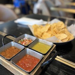 CT Cantina & Taqueria - CHIPS & 4-TYPES OF SALSA are FREE: pico de gallo, tomatillo, roasted spicy, and plain red salsas. 2/4 were spicy-ish.