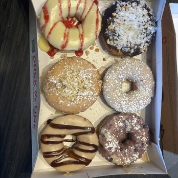 Duck Donuts - We purchased the blueberry pancake, peanut butter, paradise, coffee, cake, French toast, coconut island, bliss, and the sunrise. - Donuts Near Me - Las Vegas, Nevada