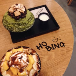 Regular sized Matcha & Banana Mango Bingsu. With a side of condensed milk.