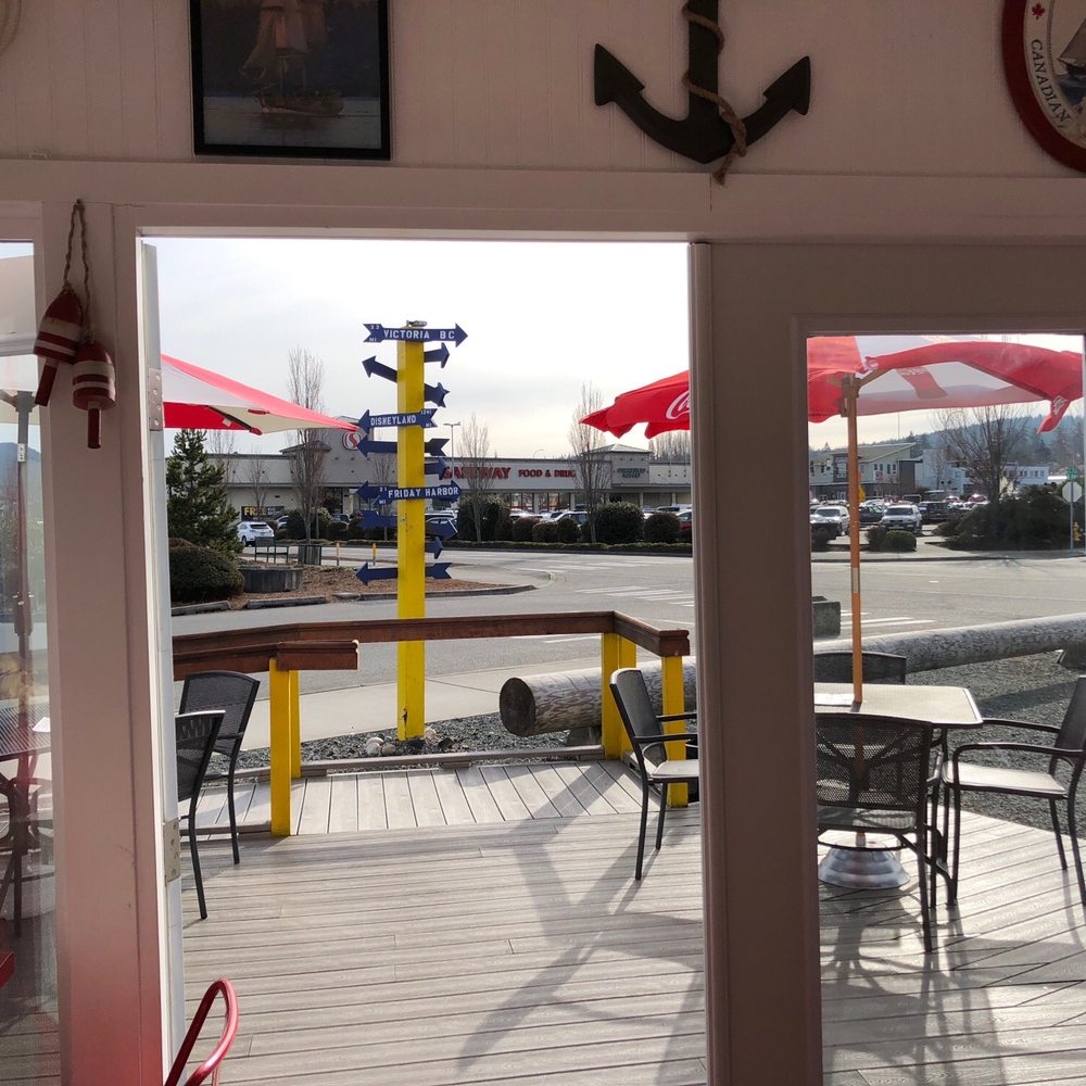 Don't worry! They have inside seating. Three tables and an electronic fireplace inside and two tables outside!