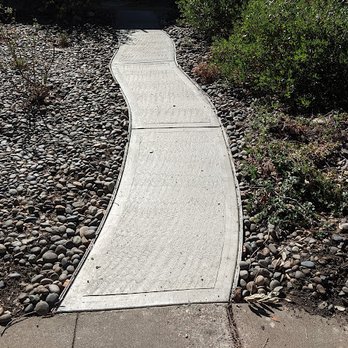 Cutting Edge Design & Build - The full length of the walkway. Cameras distort distances. The entire length of the walkway is the same width. - Landscaping Near Me Cutting Edge Design & Build - The full length of the walkway. Cameras distort distances. The entire length of the walkway is the same width. - Landscaping Near Me