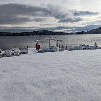 Church Landing at Mill Falls - Lake Winnipesaukee highlighted by a beautiful snowy morning - Hotels Near Me - Meredith, New Hampshire Church Landing at Mill Falls - Lake Winnipesaukee highlighted by a beautiful snowy morning - Hotels Near Me - Meredith, New Hampshire