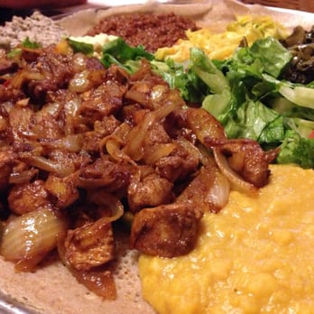 Cafe Colucci - Chicken dish. Aside from the chicken, I only cared for the yellow mixture (lentils) everything else was just weird tasting. - Ethiopian Near Me - Oakland, California Cafe Colucci - Chicken dish. Aside from the chicken, I only cared for the yellow mixture (lentils) everything else was just weird tasting. - Ethiopian Near Me - Oakland, California